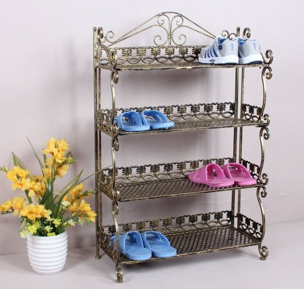 Metal shelf for shoes as a subject of maintaining order in the hallway