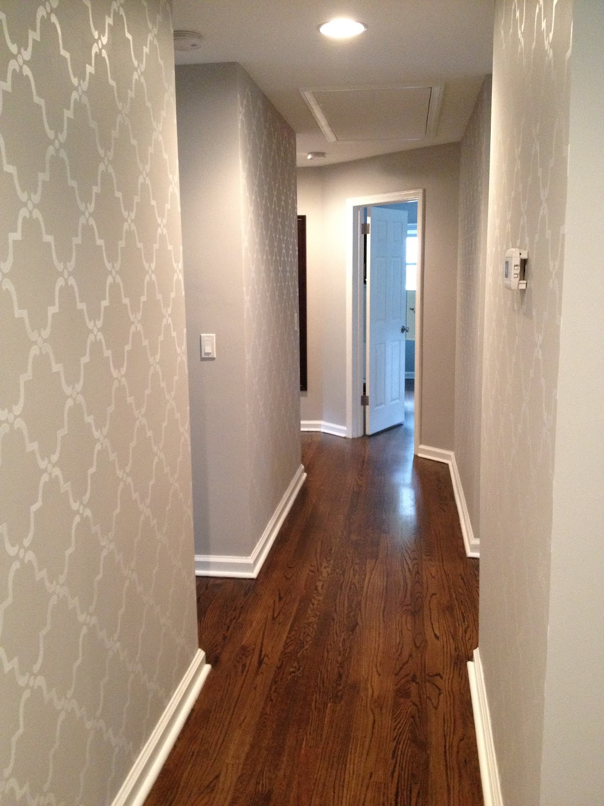 Luxurious white wallpaper for the corridor and hallway