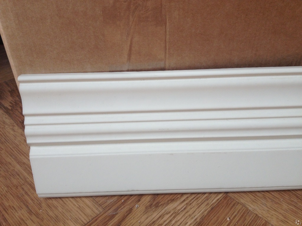 bright ceramic baseboard in the interior of the room