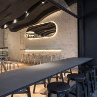 wooden black ceiling in the design of the apartment photo