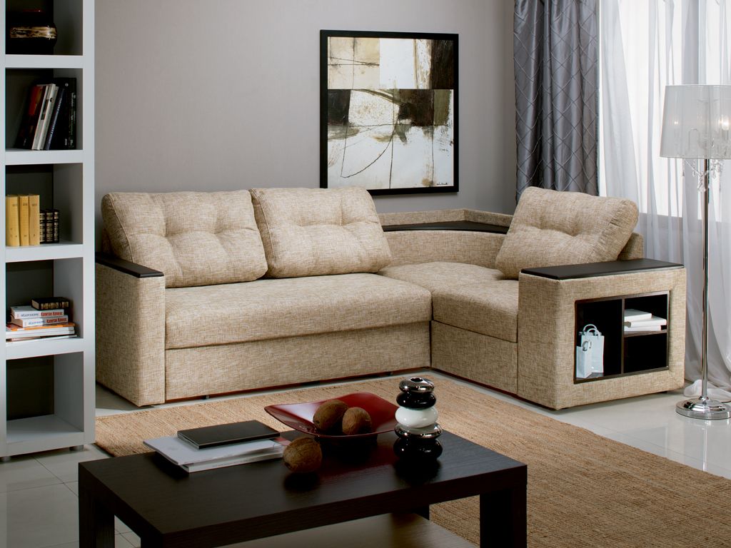 bright corner sofa in the interior of the apartment