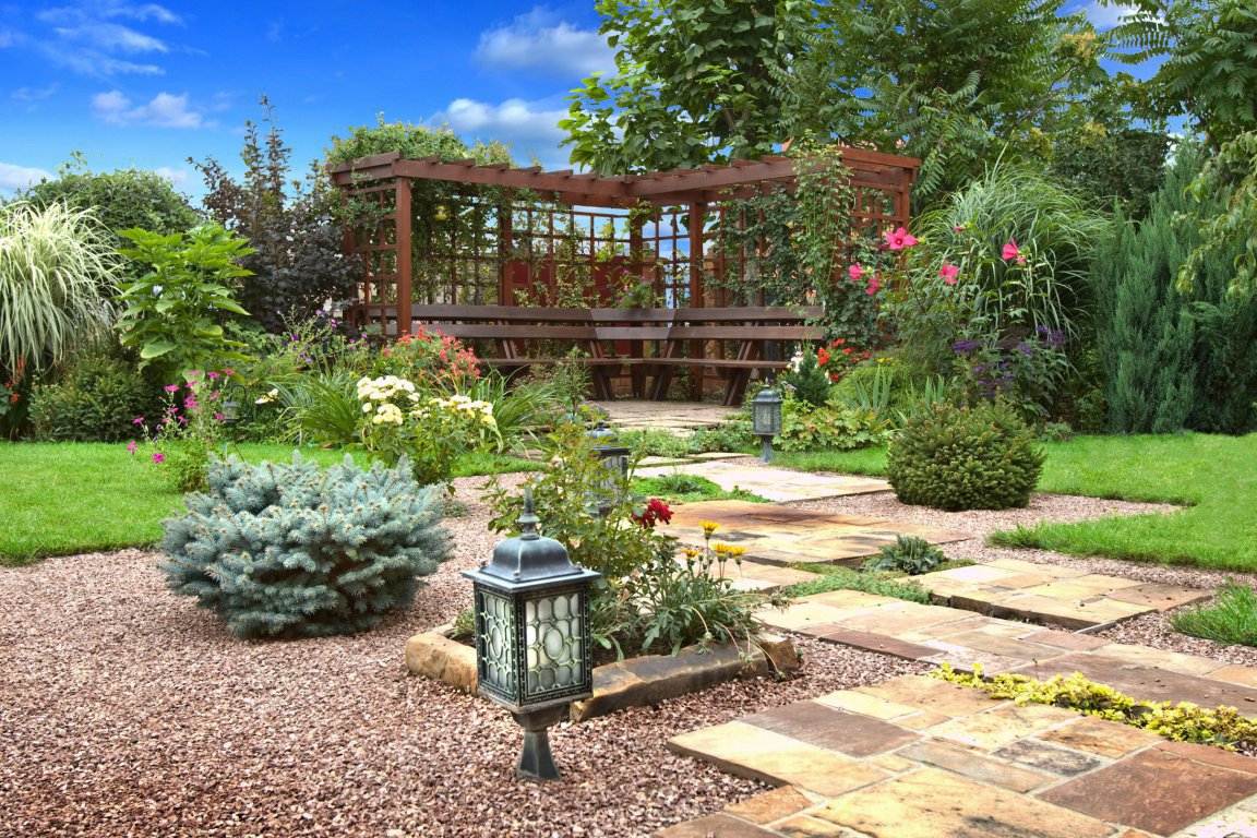 large undersized conifers in the landscape design of the summer cottage