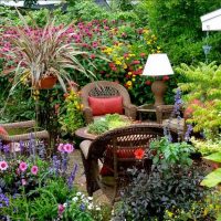 chic landscaping of a summer cottage in the English style with trees picture