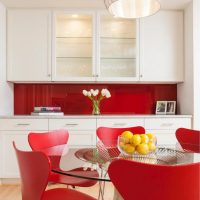 bright interior of a white kitchen with a touch of pink photo