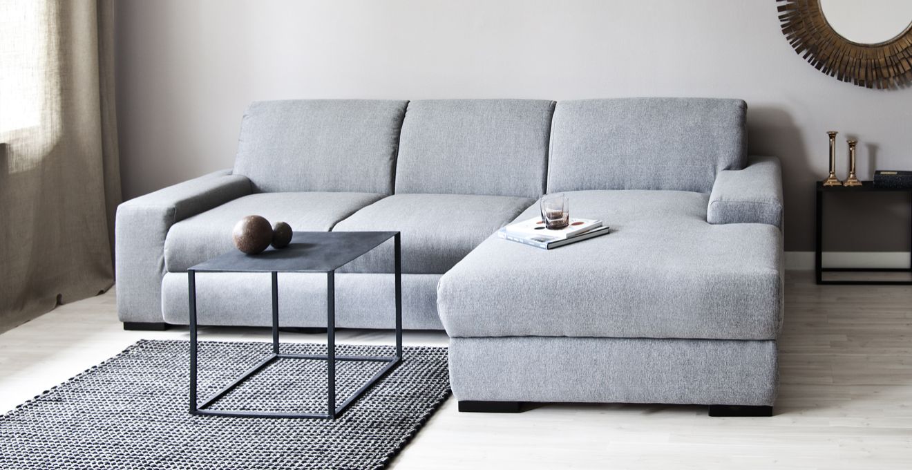 dark corner sofa in the interior of the corridor