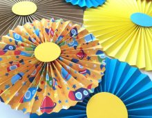 paper fan in bedroom design photo