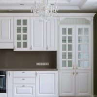 beautiful white kitchen design with a touch of blue photo