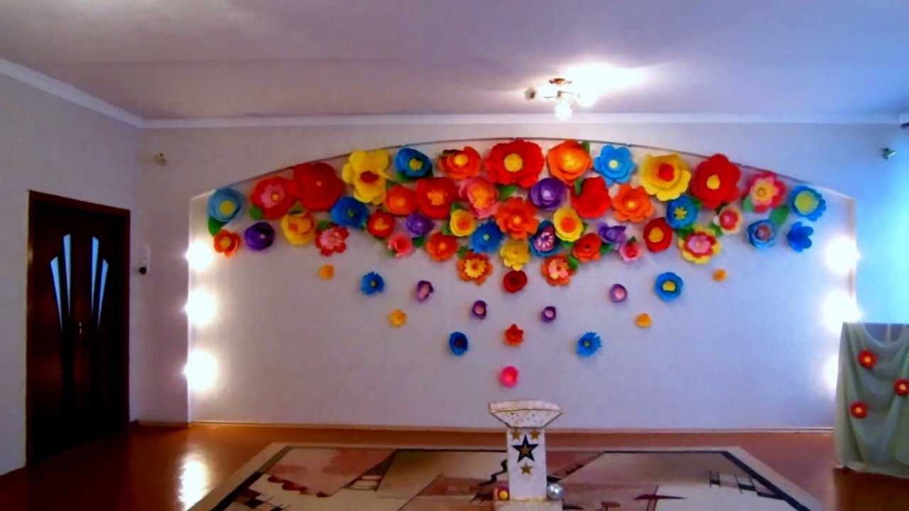 multicolored paper flowers in the facade of the festive hall