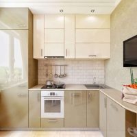 a small refrigerator in the decor of the kitchen in steel color picture