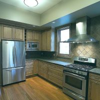 large fridge in the style of the kitchen in dark color picture