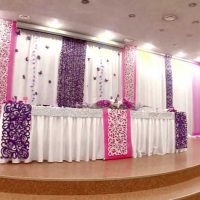 red paper flowers in the decor of the hall picture