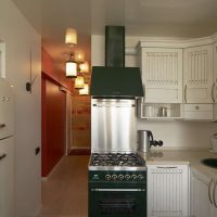 a small refrigerator in the style of the kitchen in white color photo