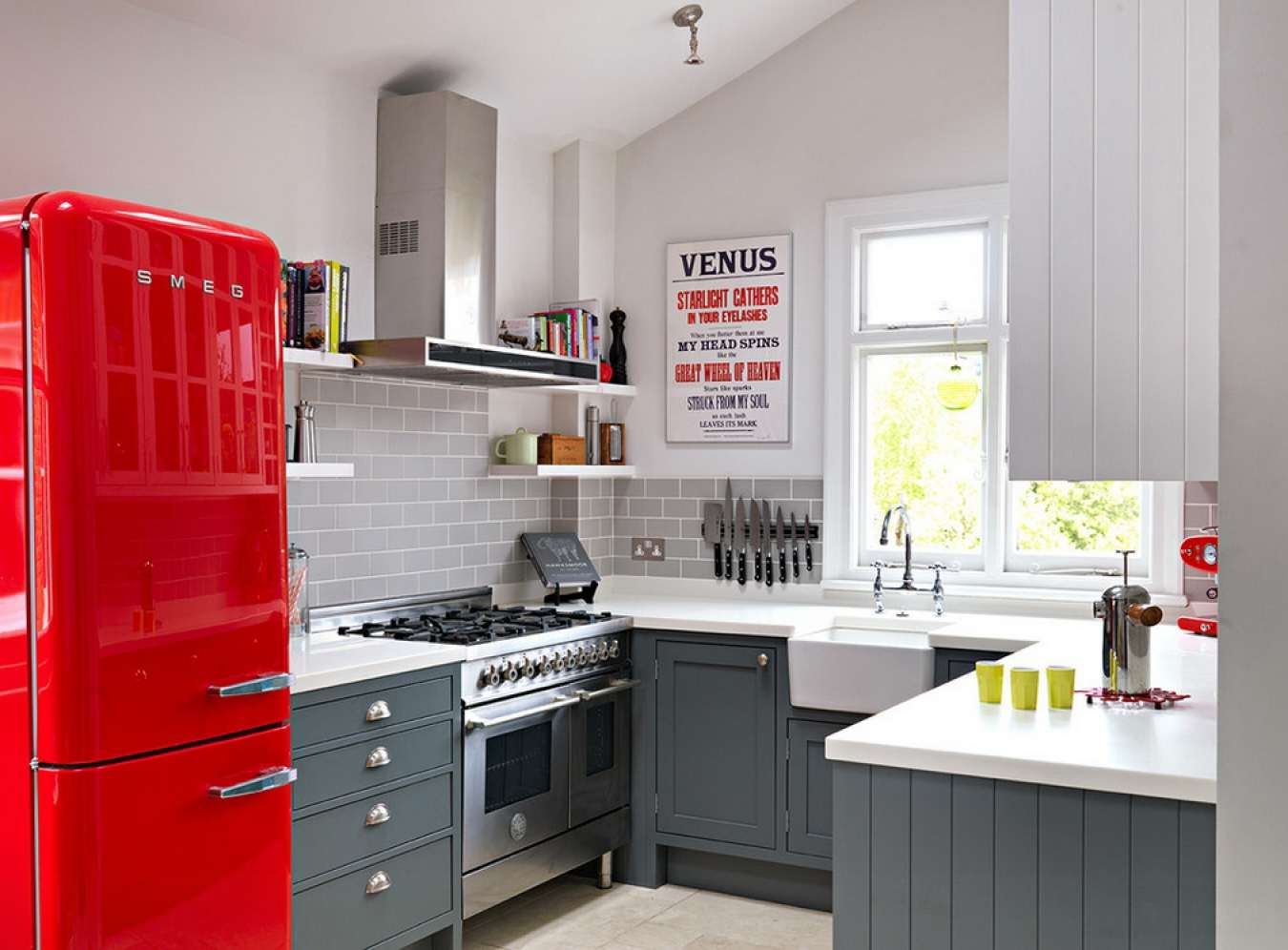 small refrigerator in the decor of the kitchen in light color