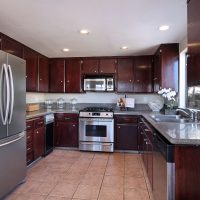 a small refrigerator in the style of the kitchen in steel color picture