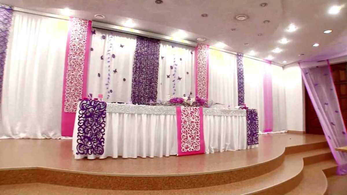 blue paper flowers in the decor of the festive hall