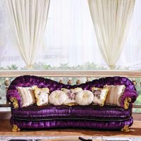 dark purple sofa in the facade of the corridor photo