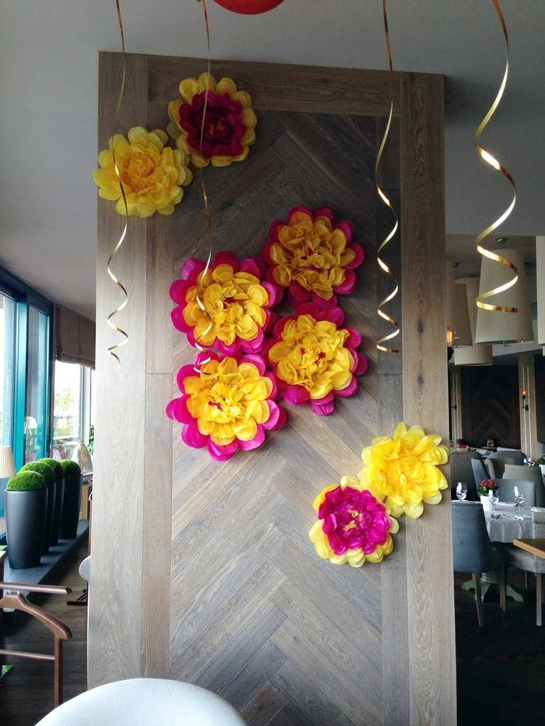 blue paper flowers in the interior of the hall