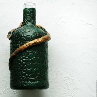 do-it-yourself version of the original decoration of bottles made of leather