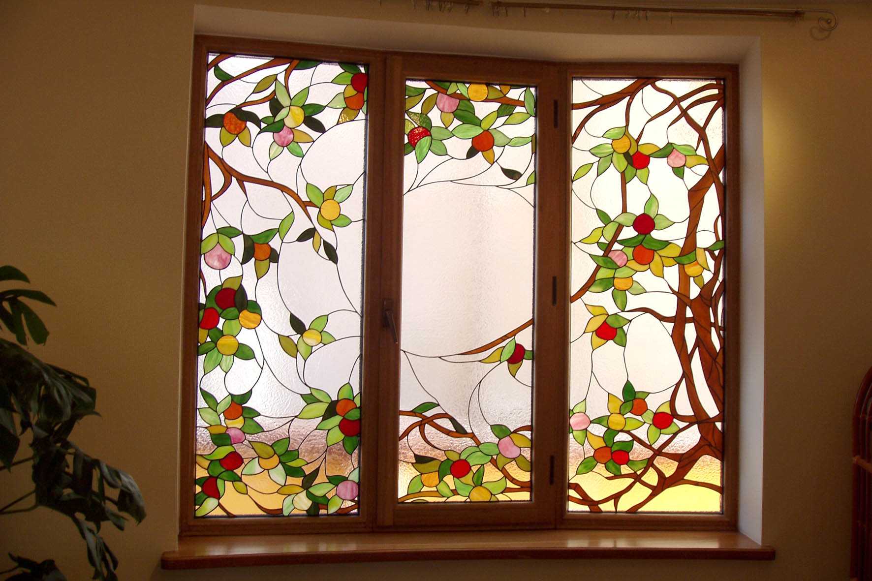 sandblasted stained glass window in the bedroom interior