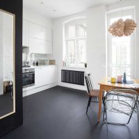 unusual dark floor in the design of the bedroom photo