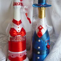 beautiful bottle decoration with colorful ribbons photo