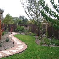 non-standard creation of the design of a summer cottage by trees with their own hands picture