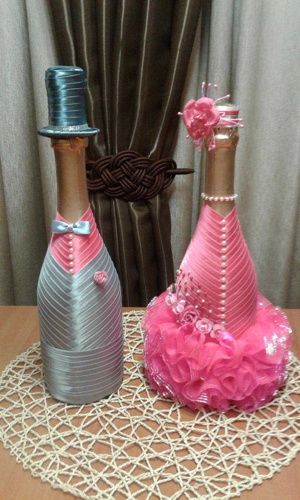 hiasan terang botol champagne dengan reben berwarna-warni