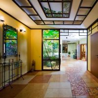 classic stained-glass window in the interior of the living room photo