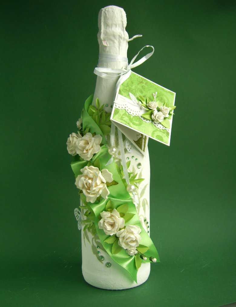 chic decoration of glass bottles with decorative ribbons