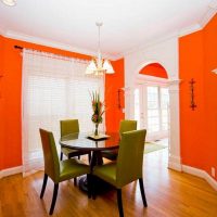 a combination of light orange in the decor of the kitchen with other colors photo