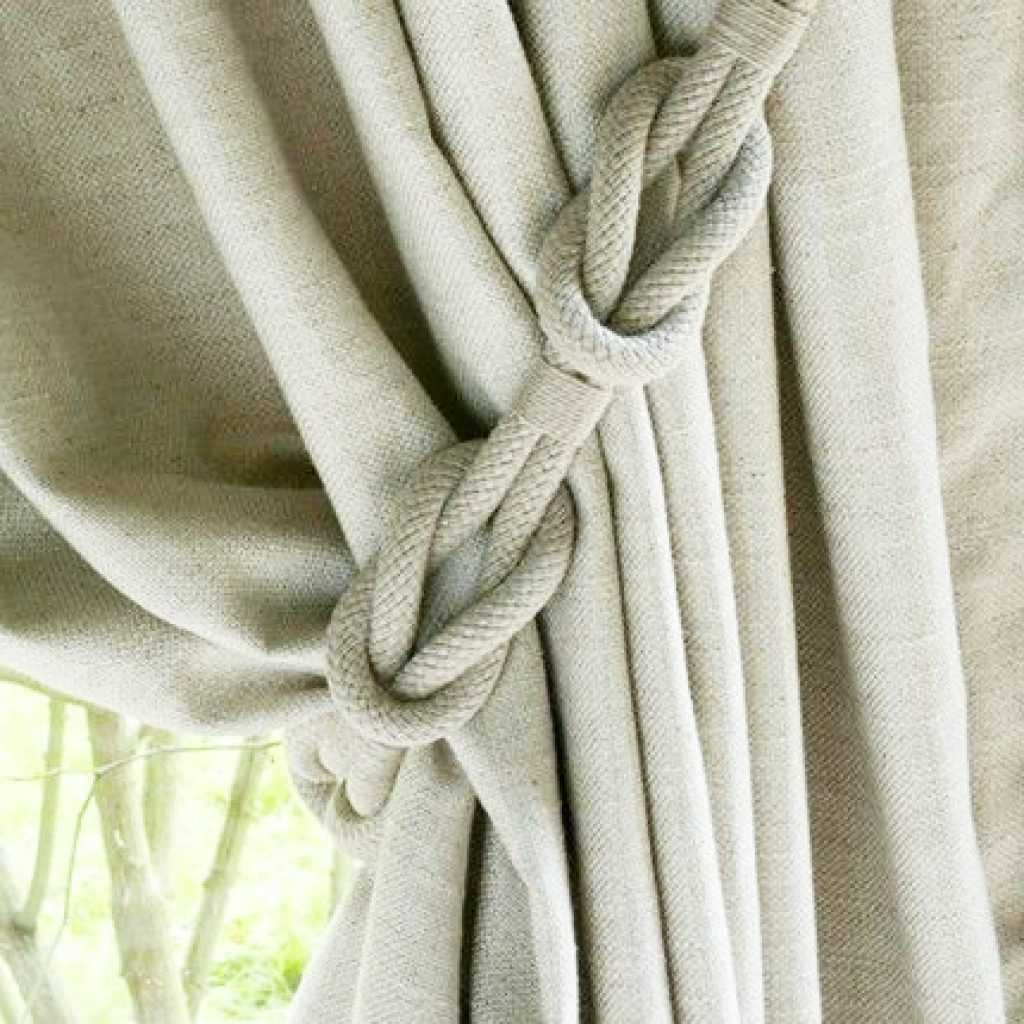 the idea of ​​original decoration of curtains with your own hands