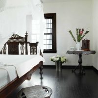 unusual dark floor in the design of the kitchen photo