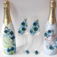 beautiful design of champagne bottles with colorful ribbons photo