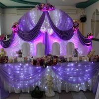 bright decoration of the wedding hall with ribbons picture