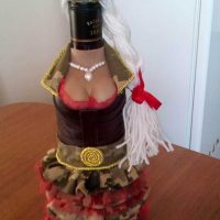 beautiful bottle decoration with decorative ribbons photo