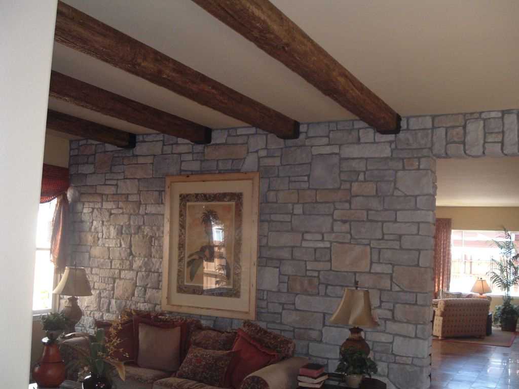 the idea of ​​the original kitchen interior with decorative beams