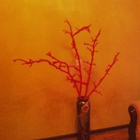 idea of ​​original design of a floor vase with decorative branches photo