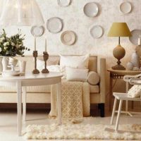 variant of the bright style of the living room with decorative plates on the wall picture