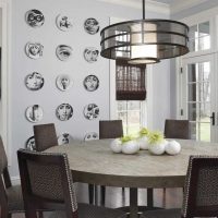 idea of ​​a beautiful room interior with decorative plates on the wall photo