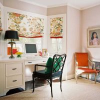 An example of a bright interior of a living room with a bay window photo