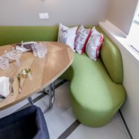 green sofa in the kitchen