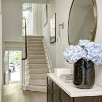 An example of a bright interior of a hallway with mirrors photo