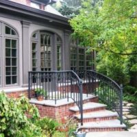 brick porch with railing