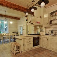 variant of the unusual interior of the kitchen in a wooden house picture