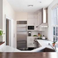 An example of a light kitchen decor in a country house photo