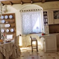 an example of an unusual design of a kitchen in a wooden house picture