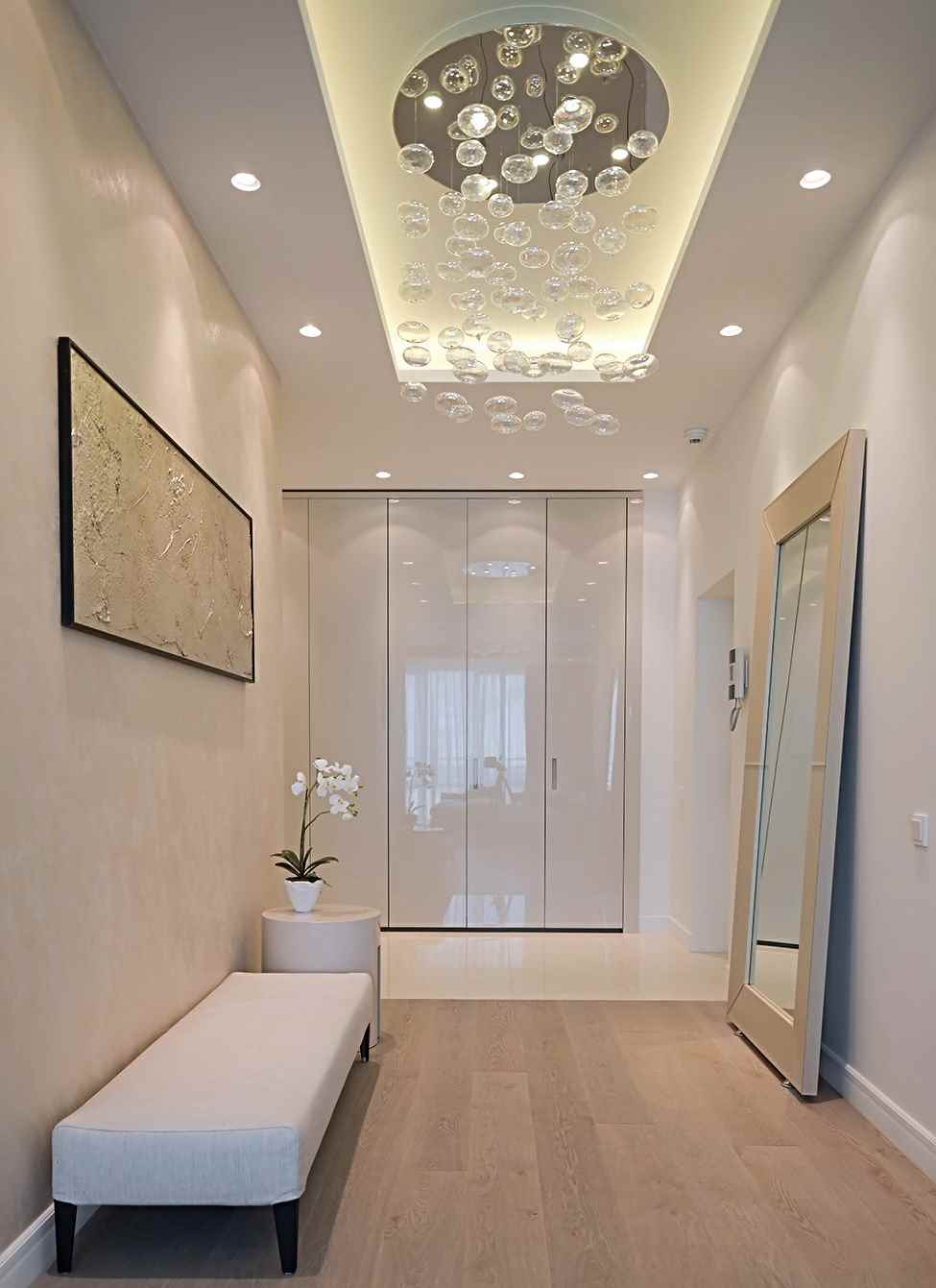 An example of a bright hallway interior with mirrors