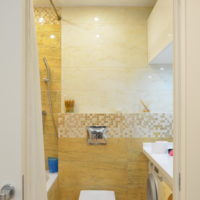 bathroom with yellow tiles