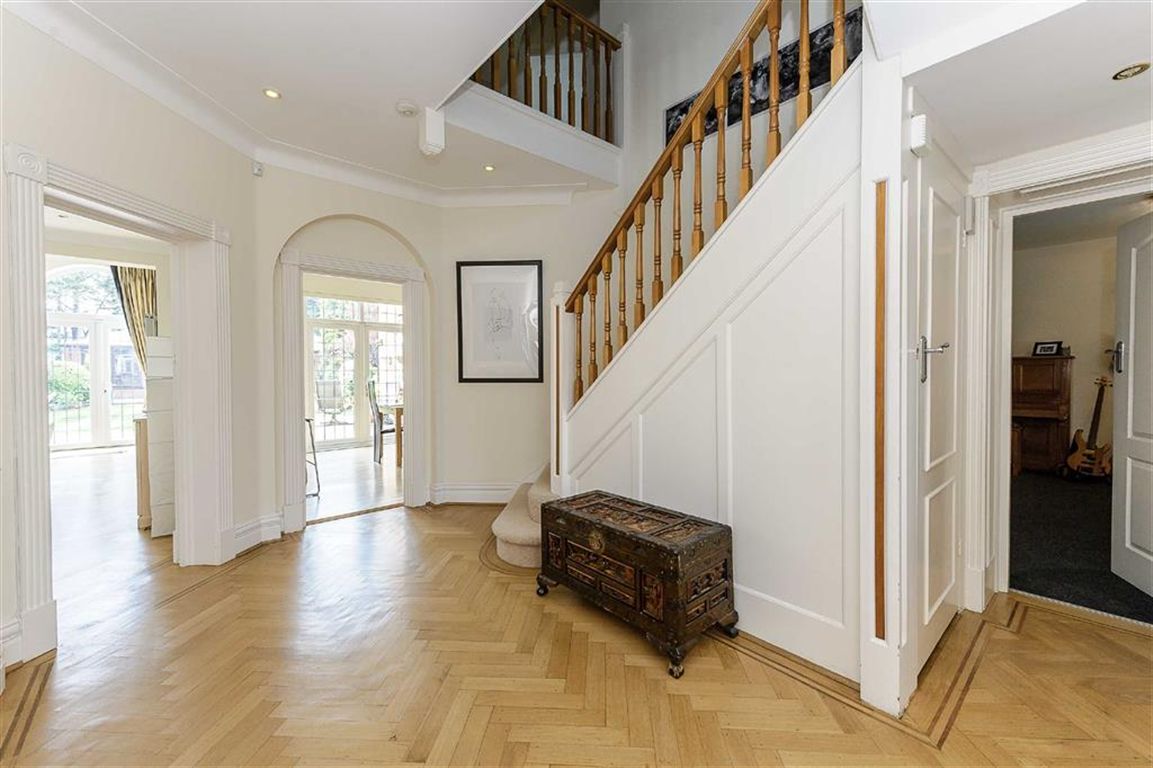 dressing room under the stairs in the hallway