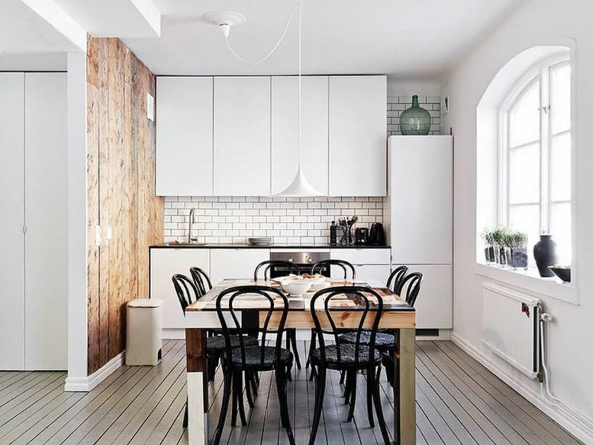 bright kitchen with wood paneling